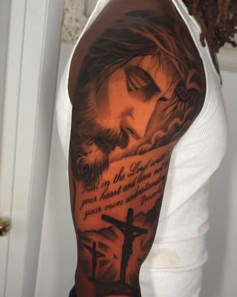 Realism + Black & Grey jesus tattoo on Upper Arm by Maximilian_Lontos on TattMe