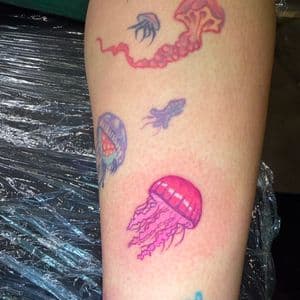 Color + Illustrative jellyfish tattoo on Upper Arm by Kiwi on TattMe