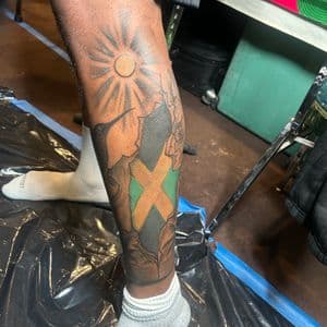 Illustrative + Color sun tattoo on Calf by Kiwi on TattMe