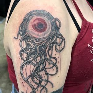 Realism + Black & Grey eyeball tattoo on Upper Arm by Kiwi on TattMe