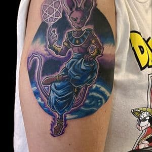 Anime + Color beerus tattoo on Upper Arm by Kiwi on TattMe
