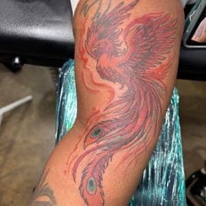 Color + Illustrative phoenix tattoo on Upper Arm by Kiwi on TattMe