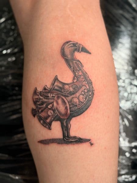 Black & Grey + Illustrative goose tattoo on Calf by Kiwi on TattMe