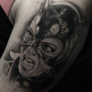 Black & Grey catwoman portrait tattoo on Upper Arm by Tattoos_By_Danny_Cruz on TattMe