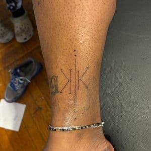 Fine Line + Black-work letters tattoo on Shin by tatsbyNunu on TattMe
