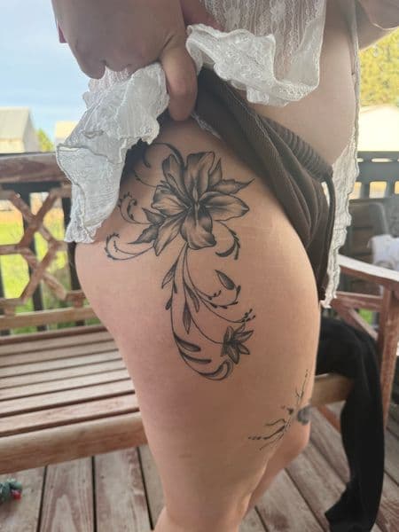 Floral + Black & Grey flower tattoo on Hip by InkedbyJunior on TattMe