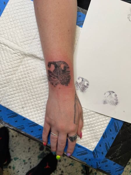 Black-work paw print tattoo on Wrist by InkedbyJunior on TattMe