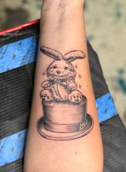 Black & Grey + Illustrative rabbit tattoo on Forearm by InkedbyJunior on TattMe