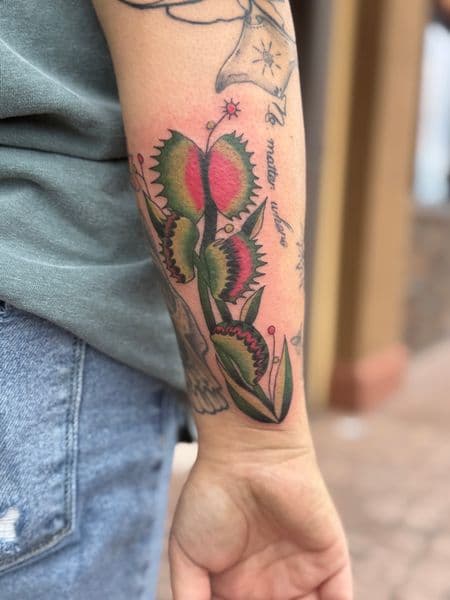 Traditional + Color venus flytrap tattoo on Forearm by InkedbyJunior on TattMe