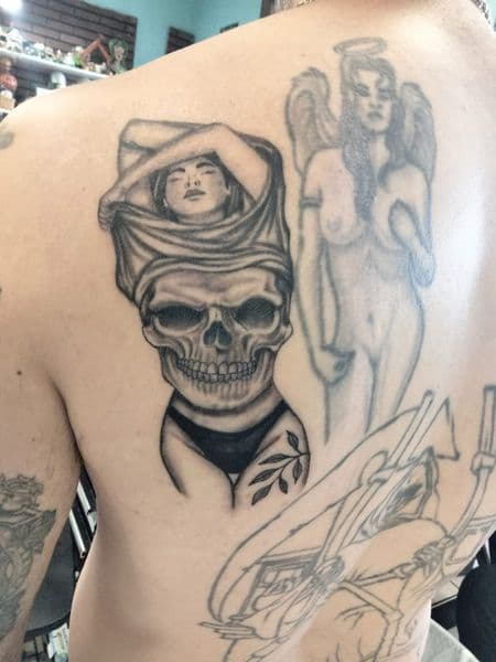 Black & Grey + Illustrative woman tattoo on Upper Back by ggtat2z_1487 on TattMe