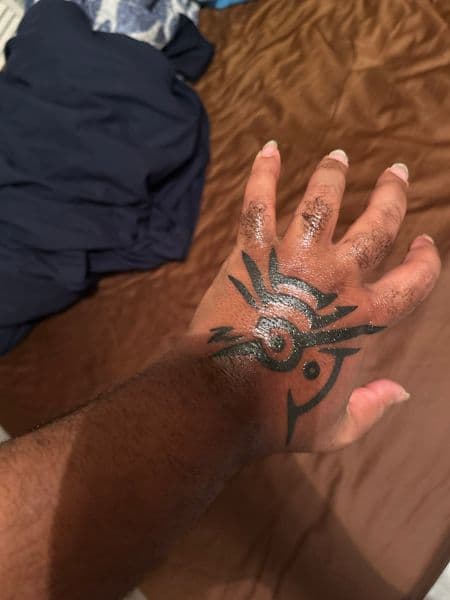 Black-work + Illustrative symbol tattoo on Hand by tatsby_sos on TattMe