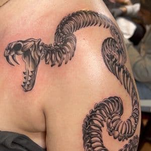 Black & Grey + Illustrative snake tattoo on Shoulder by tattoogoonz on TattMe