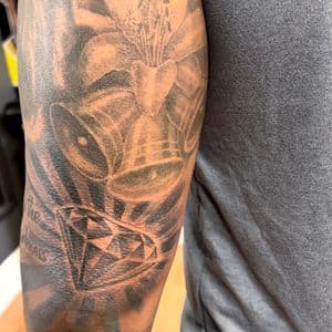 Black & Grey + Illustrative flower tattoo on Upper Arm by tattoogoonz on TattMe