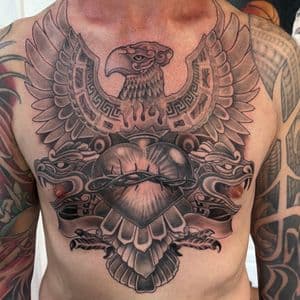 Black & Grey + Illustrative eagle tattoo on Chest by tattoogoonz on TattMe