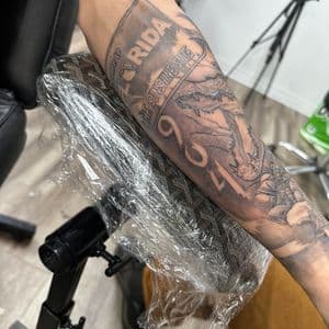 Black & Grey + Lettering florida tattoo on Forearm by LameDoingTatts on TattMe