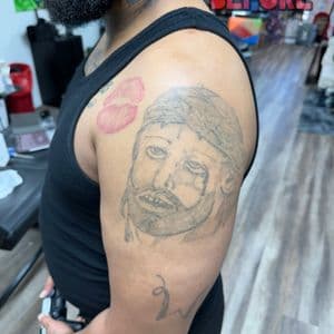 Line-work + Color face tattoo on Upper Arm by LameDoingTatts on TattMe