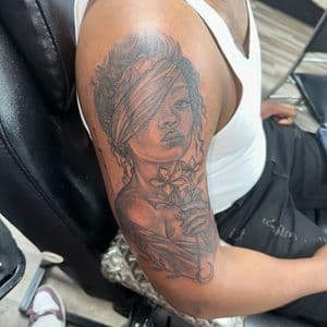 Black & Grey + Illustrative woman tattoo on Upper Arm by LameDoingTatts on TattMe