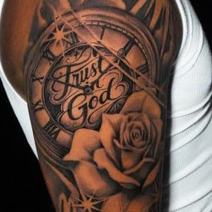 Black & Grey + Lettering pocket watch tattoo on Upper Arm by TATMANERC on TattMe