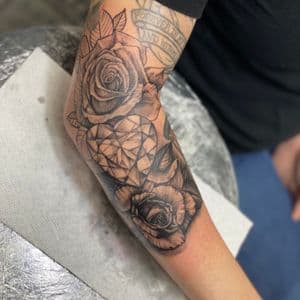 Black & Grey + Floral roses tattoo on Elbow by 438Star on TattMe