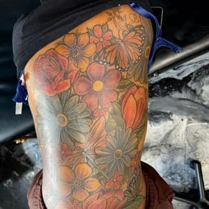 Floral + Color flowers tattoo on Full Back by 438Star on TattMe