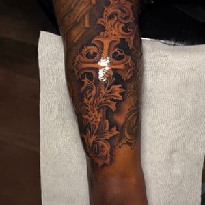 Black & Grey + Illustrative cross tattoo on Half Sleeve by tattoo.banditt on TattMe