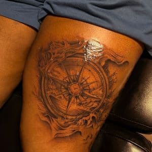 Black & Grey + Illustrative compass tattoo on Thigh by tattoo.banditt on TattMe