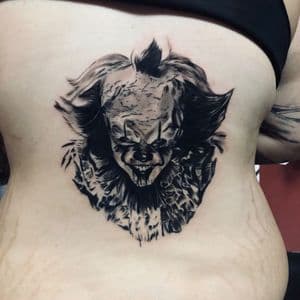 Black & Grey + Realism pennywise tattoo on Ribs by ink_by_Ronnie on TattMe