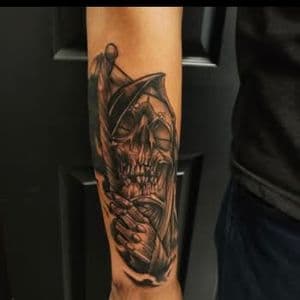 Black & Grey + Illustrative grim reaper tattoo on Forearm by ink_by_Ronnie on TattMe