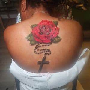 Color + Floral rose tattoo on Upper Back by Jacob_Love_TD on TattMe