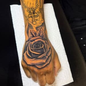 Black & Grey + Floral rose tattoo on Hand by TaeDavinci on TattMe