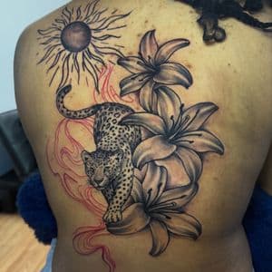 Black & Grey + Floral leopard tattoo on Upper Back by TaeDavinci on TattMe