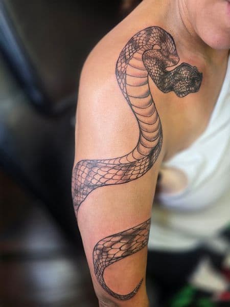 Black & Grey + Illustrative snake tattoo on Upper Arm by Qjoriginals43 on TattMe