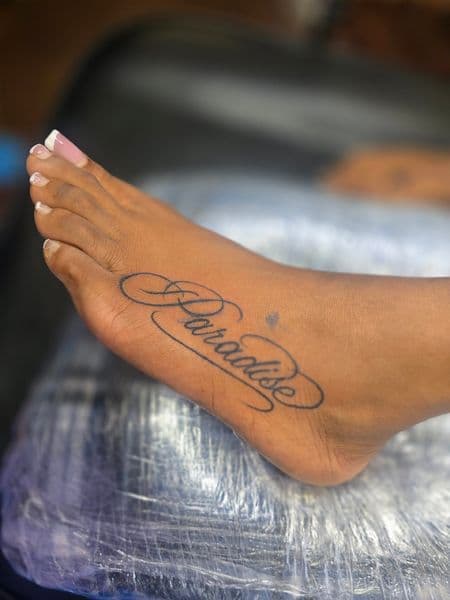 Lettering + Script paradise tattoo on Foot by Qjoriginals43 on TattMe