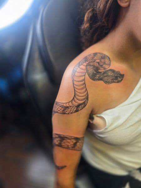 Black-work + Line-work snake tattoo on Shoulder by Qjoriginals43 on TattMe