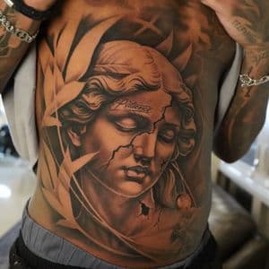 Realism + Black & Grey statue tattoo on Side (Torso) by Sixteenth_Studio on TattMe