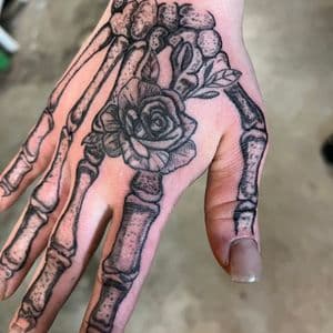 Black & Grey + Illustrative skeleton tattoo on Hand by nomad_ink on TattMe