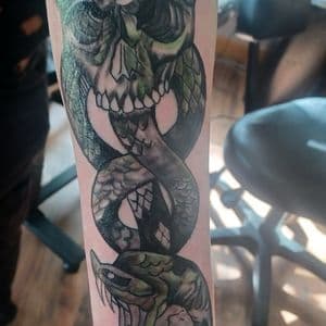 Illustrative + Color skull tattoo on Forearm by nomad_ink on TattMe
