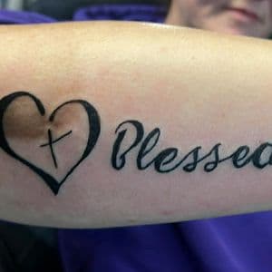 Black & Grey + Lettering heart tattoo on Forearm by nomad_ink on TattMe