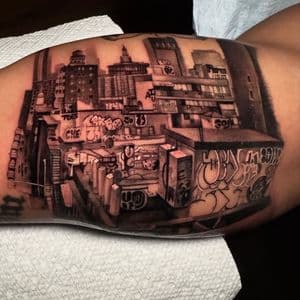 Black & Grey + Illustrative cityscape tattoo on Upper Arm by D-Artist on TattMe