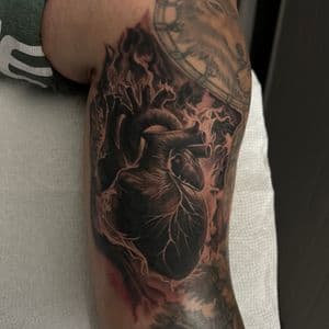 Black & Grey + Realism anatomical heart tattoo on Upper Arm by D-Artist on TattMe