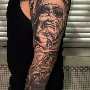 Black & Grey + Realism rapper tattoo on Full Sleeve by D-Artist on TattMe