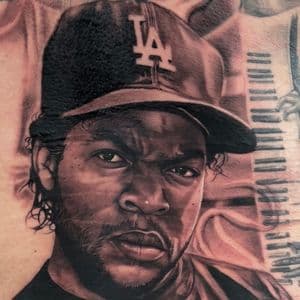 Realism + Black & Grey man tattoo on Lower Back by D-Artist on TattMe
