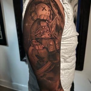 Black & Grey + Pop Culture astronaut tattoo on Upper Arm by D-Artist on TattMe