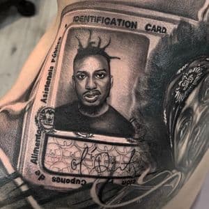 Realism + Black & Grey identification card tattoo on Shoulder by D-Artist on TattMe