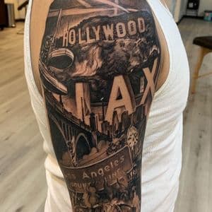 Black & Grey + Realism los angeles tattoo on Upper Arm by D-Artist on TattMe