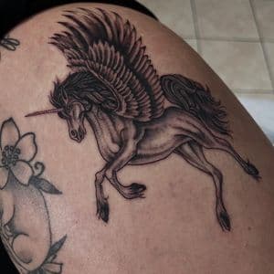 Black & Grey + Fine Line unicorn tattoo on Thigh by Q_tattoo on TattMe