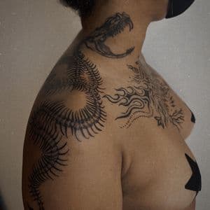 Black-work + Illustrative dragon tattoo on Shoulder by Q_tattoo on TattMe