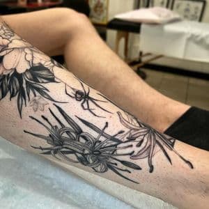 Black & Grey + Floral flowers tattoo on Calf by Q_tattoo on TattMe