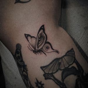 Black-work + Illustrative butterfly tattoo on Ribs by Q_tattoo on TattMe