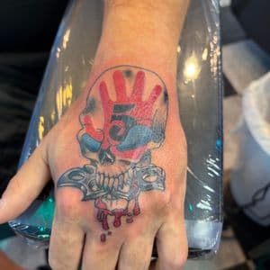 Color + Illustrative skull tattoo on Hand by Meaney_Tattoos_06 on TattMe